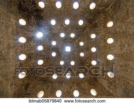 Stock Image - Vaulted ceiling with light, historic Moorish bath house, Arabic baths, El Bañuelo, Granada, Andalusia, Spain, Europe. Fotosearch