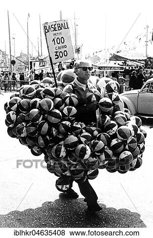 Stock Photo - Vendor of baseballs, between 50s and 60s, exact location unknown, France, Europe. Fotosearch