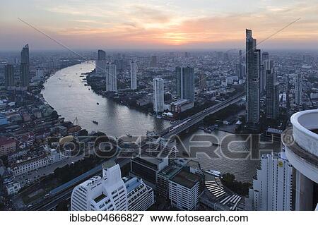 View from Lebua State Tower with Chao Phraya River, bridge to Khlong San, dusk, Bang Rak District, Bangkok, Thailand, Asia View Large Photo Image Stock Photo - View from Lebua State Tower with Chao Phraya River, bridge to Khlong San, dusk, Bang Rak District, Bangkok, Thailand, Asia. Fotosearch