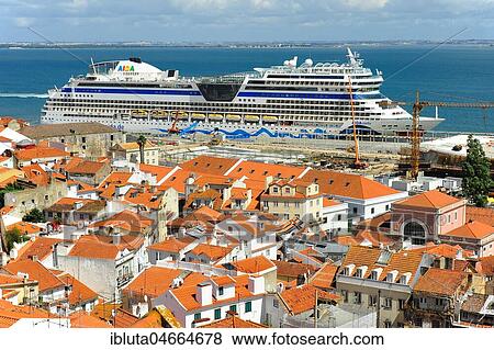 Stock Photo - View from Miradouro das Portas do Sol on river Tejo with docked cruise ship, Lisbon, Portugal, Europe. Fotosearch