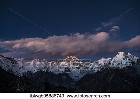 View in the evening light from Renjo La Pass 5417m to the east on Himalaya with Gyachung Kang 7952m, Khumbu, Nepal, Himalaya, Asia View Large Photo Image Stock Photo - View in the evening light from Renjo La Pass 5417m to the east on Himalaya with Gyachung Kang 7952m, Khumbu, Nepal, Himalaya, Asia. Fotosearch
