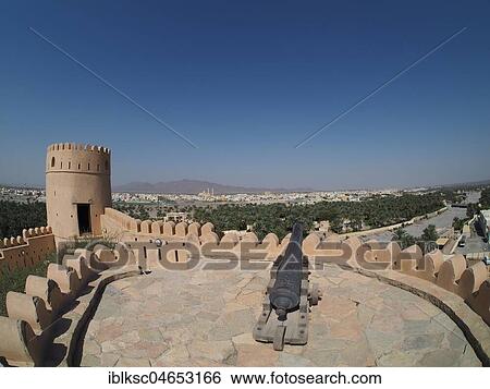 View of city, cannon on fortress Nakhl, Nakhl, Oman, Asia View Large Photo Image Stock Photograph - View of city, cannon on fortress Nakhl, Nakhl, Oman, Asia. Fotosearch