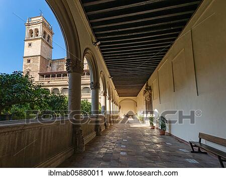 View of the church tower through arcades, cloister and courtyard with orange trees in the monastery, Monasterio de San Jerónimo, Granada, Andalusia, Spain, Europe View Large Photo Image Stock Image - View of the church tower through arcades, cloister and courtyard with orange trees in the monastery, Monasterio de San Jerónimo, Granada, Andalusia, Spain, Europe. Fotosearch