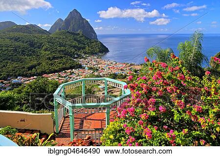 Stock Image - View of the village and the two Pitons, Gros Piton 770m and Petit Piton 743m, Soufriere, St. Lucia, Lesser Antilles, West Indian Islands, Caribbean Sea. Fotosearch