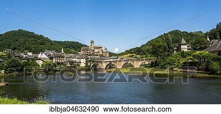View on village of Estaing on river Lot, Way of St. James, Aveyron departement, Occitanie, France, Europe View Large Photo Image Stock Image - View on village of Estaing on river Lot, Way of St. James, Aveyron departement, Occitanie, France, Europe. Fotosearch