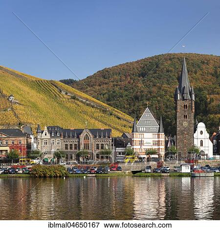 Stock Photo - View over the Moselle to the village in autumn, Bernkastel-Kues, Rhineland-Palatinate, Germany, Europe. Fotosearch