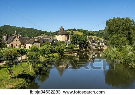 Stock Image - Village of Sainte-Eulalie-d'Olt at river Lot, Aveyron department, Occitanie, France, Europe. Fotosearch