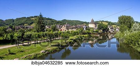 Stock Photography - Village of Sainte-Eulalie-d'Olt at river Lot, Aveyron department, Occitanie, France, Europe. Fotosearch