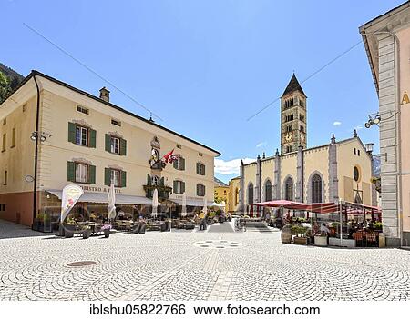 Stock Photograph - Village square with collegiate church of San Vittore Mauro, Poschiavo, Puschlav, Canton Graubünden, Switzerland, Europe. Fotosearch