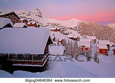 Village view snow-covered against Bettmerhorn 2872m at dusk, Bettmeralp, Aletsch area, Oberwallis, Valais, Switzerland, Europe View Large Photo Image Picture - Village view snow-covered against Bettmerhorn 2872m at dusk, Bettmeralp, Aletsch area, Oberwallis, Valais, Switzerland, Europe. Fotosearch