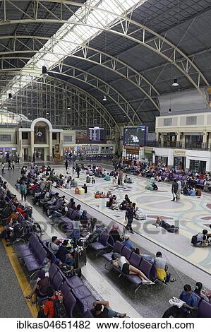 Waiting passengers in the historic station concourse from 1916, Hua Lamphong, Bangkok Central Station, Pathum Wan, Bangkok, Thailand, Asia View Large Photo Image Stock Image - Waiting passengers in the historic station concourse from 1916, Hua Lamphong, Bangkok Central Station, Pathum Wan, Bangkok, Thailand, Asia. Fotosearch