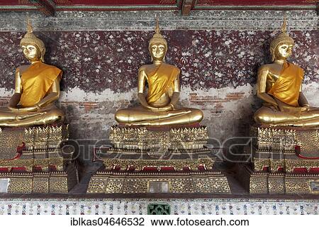 Wall with golden Buddha statues in meditation posture, on decorated pedestals, Phra Rabieng Kot, Wat Suhtat, royal temple, Phra Nakhon, Bangkok, Thailand, Asia View Large Photo Image Stock Image - Wall with golden Buddha statues in meditation posture, on decorated pedestals, Phra Rabieng Kot, Wat Suhtat, royal temple, Phra Nakhon, Bangkok, Thailand, Asia. Fotosearch