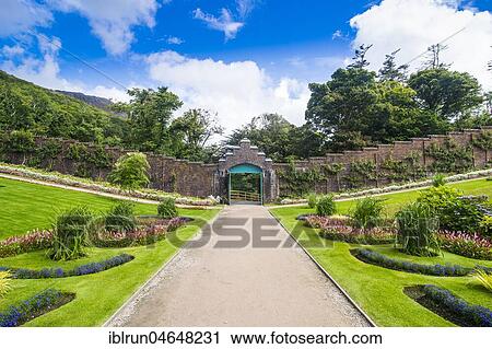 Stock Image - Walled victorian garden in Kylemore abbey, Connemara National Park, Republic of Ireland. Fotosearch