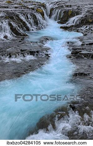 Stock Photography - Wasserfall Bruarfoss mit turkiser Fliesrinne, Island, Europa. Fotosearch