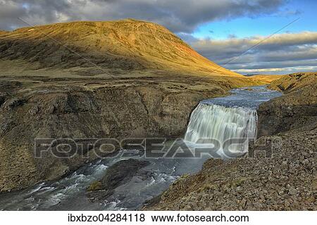 Stock Photo - Wasserfall Pornfoss im Abendlicht, Island, Europa. Fotosearch
