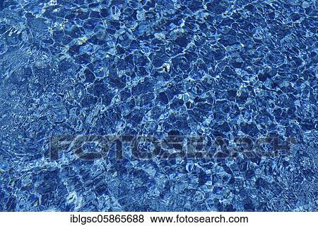 Stock Photo - Water surface with reflections over stony ground, pattern, background image, province of Quebec, Canada, North America. Fotosearch