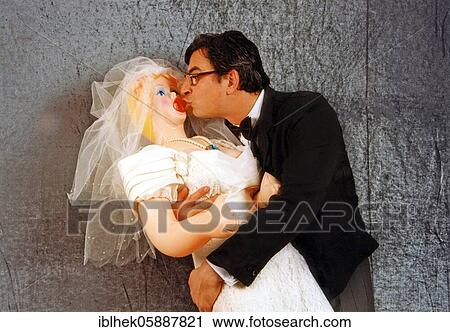 Wedding, Man marries a sex doll, wedding picture, wedding dress, kiss, Berlin, Germany, Europe View Large Photo Image Stock Image - Wedding, Man marries a sex doll, wedding picture, wedding dress, kiss, Berlin, Germany, Europe. Fotosearch
