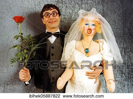 Wedding, Man marries a sex doll, wedding dress, wedding picture, red rose, Berlin, Germany, Europe View Large Photo Image Stock Image - Wedding, Man marries a sex doll, wedding dress, wedding picture, red rose, Berlin, Germany, Europe. Fotosearch