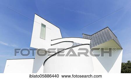 Stock Image - White modern building of towers, ramps and cubes, Vitra Design Museum, Architect Frank Gehry, Vitra Campus, Weil am Rhein, Baden-Württemberg, Germany, Europe. Fotosearch