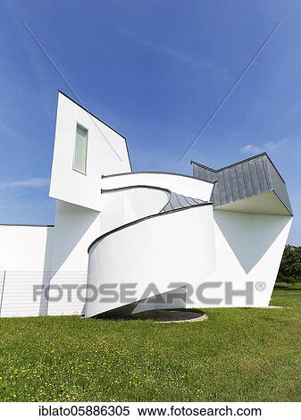 White modern building of towers, ramps and cubes, Vitra Design Museum, Architect Frank Gehry, Vitra Campus, Weil am Rhein, Baden-Württemberg, Germany, Europe View Large Photo Image Stock Photography - White modern building of towers, ramps and cubes, Vitra Design Museum, Architect Frank Gehry, Vitra Campus, Weil am Rhein, Baden-Württemberg, Germany, Europe. Fotosearch