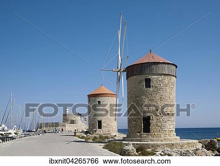 Windmuhlen am Mandraki-Hafen, Rhodos-Stadt, Rhodos, Dodekanes, Griechenland, Europa View Large Photo Image Stock Photograph - Windmuhlen am Mandraki-Hafen, Rhodos-Stadt, Rhodos, Dodekanes, Griechenland, Europa. Fotosearch