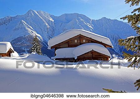 Winter landscape with snow-covered chalet, in the back Bettlihorn 2993m, Riederalp, Aletsch area, Upper Valais, Valais, Switzerland, Europe View Large Photo Image Stock Photo - Winter landscape with snow-covered chalet, in the back Bettlihorn 2993m, Riederalp, Aletsch area, Upper Valais, Valais, Switzerland, Europe. Fotosearch