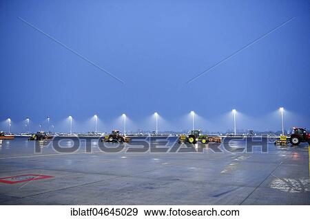 Winter service in action, snow clearing and de-icing on the east apron, Munich Airport, Upper Bavaria, Germany, Europe View Large Photo Image Stock Photo - Winter service in action, snow clearing and de-icing on the east apron, Munich Airport, Upper Bavaria, Germany, Europe. Fotosearch