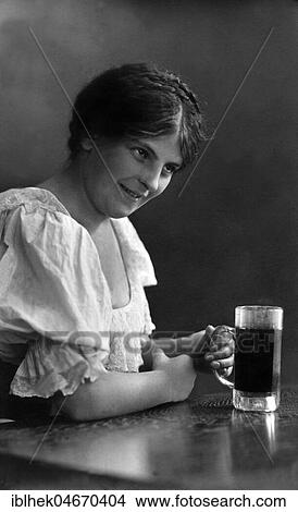 Picture - Woman drinking beer, 1920s, Germany, Europe. Fotosearch