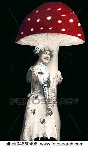 Woman embraces huge fly agaric, 1910s, Germany, Europe View Large Photo Image Stock Photograph - Woman embraces huge fly agaric, 1910s, Germany, Europe. Fotosearch