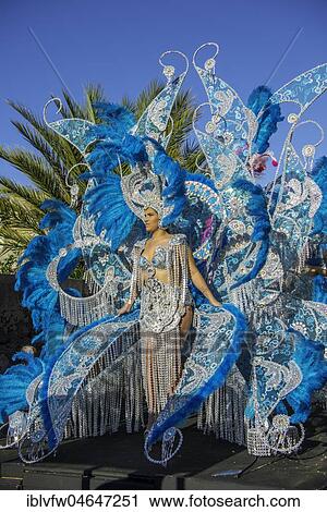 Woman in fanciful costume, Carnival, Street carnival, Puerto de la Cruz, Tenerife, Canary Islands, Spain, Europe View Large Photo Image Stock Image - Woman in fanciful costume, Carnival, Street carnival, Puerto de la Cruz, Tenerife, Canary Islands, Spain, Europe. Fotosearch