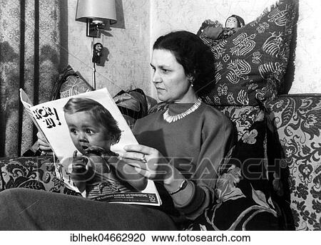 Woman reading a Hör zu magazine, 1950s, Germany, Europe View Large Photo Image Stock Image - Woman reading a Hör zu magazine, 1950s, Germany, Europe. Fotosearch