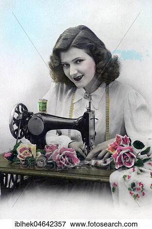 Stock Photo - Woman sewing, ca. 1930, Germany, Europe. Fotosearch