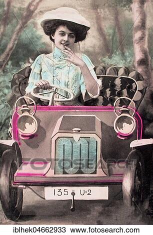 Woman sitting in a car made of cardboard, 1910s, hand-coloured, Germany, Europe View Large Photo Image Stock Image - Woman sitting in a car made of cardboard, 1910s, hand-coloured, Germany, Europe. Fotosearch