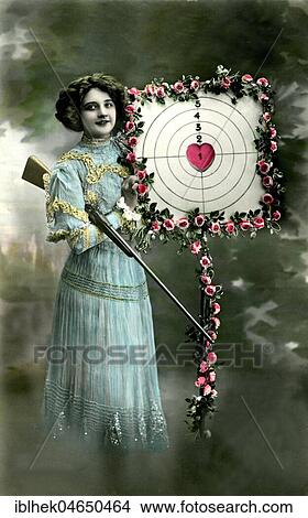 Woman with a target, a heart in the center, meeting love, 1910s, Germany, Europe View Large Photo Image Picture - Woman with a target, a heart in the center, meeting love, 1910s, Germany, Europe. Fotosearch