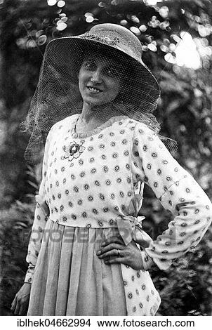 Woman with hat and mosquito net on her face, 1930s, Germany, Europe View Large Photo Image Picture - Woman with hat and mosquito net on her face, 1930s, Germany, Europe. Fotosearch