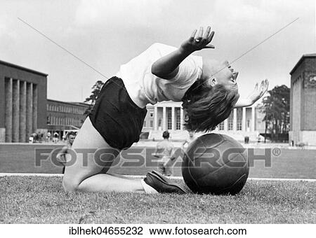 Woman with medicine ball, 1930s, exact place unknown, Germany, Europe View Large Photo Image Stock Image - Woman with medicine ball, 1930s, exact place unknown, Germany, Europe. Fotosearch