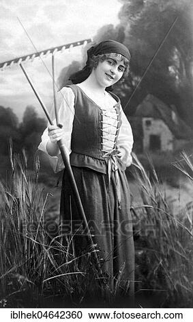 Woman with rake, 1910s, Germany, Europe View Large Photo Image Stock Image - Woman with rake, 1910s, Germany, Europe. Fotosearch