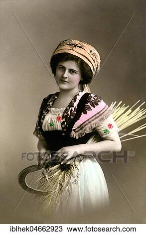Woman with sickle and straw, 1910s, handcoloured, Germany, Europe View Large Photo Image Stock Image - Woman with sickle and straw, 1910s, handcoloured, Germany, Europe. Fotosearch