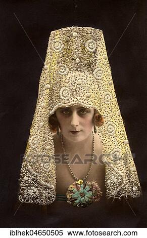 Stock Photography - Woman with strange hat, Hat fashion, Fashion satire, 1910s, Germany, Europe. Fotosearch