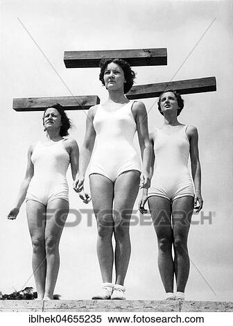 Stock Photography - Women balancing blocks of wood, 1940s, exact place unknown, Germany, Europe. Fotosearch