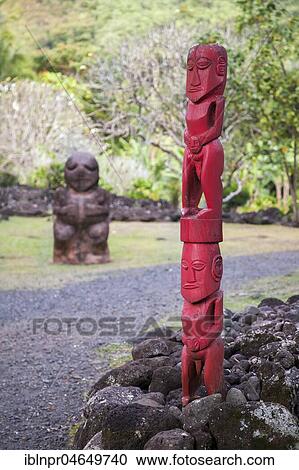 Stock Image - Wooden statue, Marae Mahaitea, cult site, Tahiti, French Polynesia, Oceania. Fotosearch