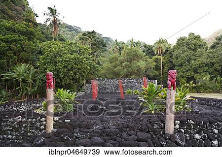 Stock Photo - Wooden statues, Marae Mahaitea, cult site, Tahiti, French Polynesia, Oceania. Fotosearch