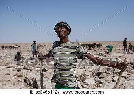 Worker in the Dallol Salt Desert,, Ethiopia, Africa View Large Photo Image Stock Photo - Worker in the Dallol Salt Desert,, Ethiopia, Africa. Fotosearch