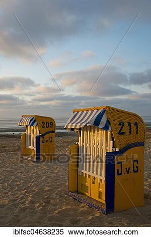 Yellow beach chairs during off-season, Duhnen, Cuxhaven, Lower Saxony, Germany, Europe View Large Photo Image Stock Photography - Yellow beach chairs during off-season, Duhnen, Cuxhaven, Lower Saxony, Germany, Europe. Fotosearch