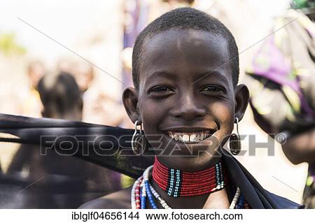 Young girl of Arbore tribe, portrait, Turmi, Southern Nations Nationalities and Peoples' Region, Ethiopia, Africa View Large Photo Image Picture - Young girl of Arbore tribe, portrait, Turmi, Southern Nations Nationalities and Peoples' Region, Ethiopia, Africa. Fotosearch