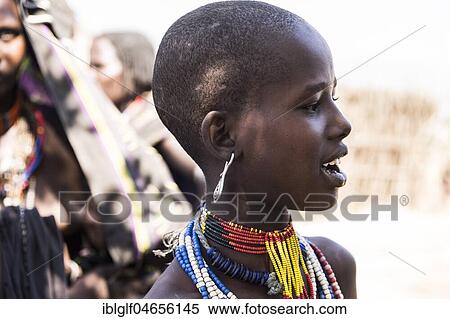 Stock Photography - Young girl of Arbore tribe, portrait, Turmi, Southern Nations Nationalities and Peoples' Region, Ethiopia, Africa. Fotosearch