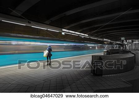 Young woman alone at the platform, subway station Opernplatz, Frankfurt am Main, Hesse, Germany, Europe View Large Photo Image Stock Photo - Young woman alone at the platform, subway station Opernplatz, Frankfurt am Main, Hesse, Germany, Europe. Fotosearch