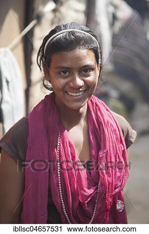 Young woman, smiling, in the slum at the Ghazipur garbage dump, portrait, New Delhi, India, Asia View Large Photo Image Stock Image - Young woman, smiling, in the slum at the Ghazipur garbage dump, portrait, New Delhi, India, Asia. Fotosearch