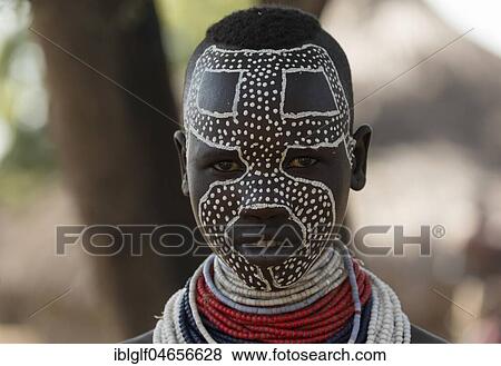 Young woman with face painting from the Karo tribe, portrait, Southern Nations Nationalities and Peoples' Region, Ethiopia, Africa View Large Photo Image Stock Photo - Young woman with face painting from the Karo tribe, portrait, Southern Nations Nationalities and Peoples' Region, Ethiopia, Africa. Fotosearch