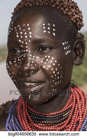 Stock Photography - Young woman with face painting, portrait, check tribe, Southern Nations Nationalities and Peoples' Region, Ethiopia, Africa. Fotosearch